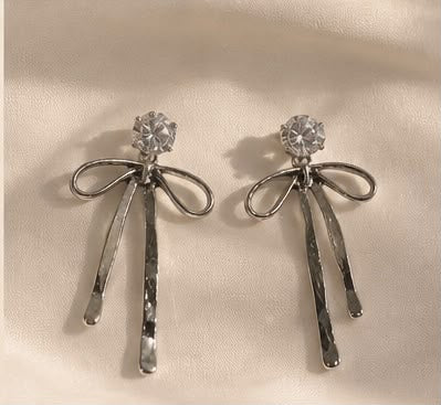 Silver tassel bow earrings