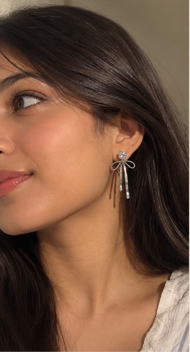 Silver tassel bow earrings